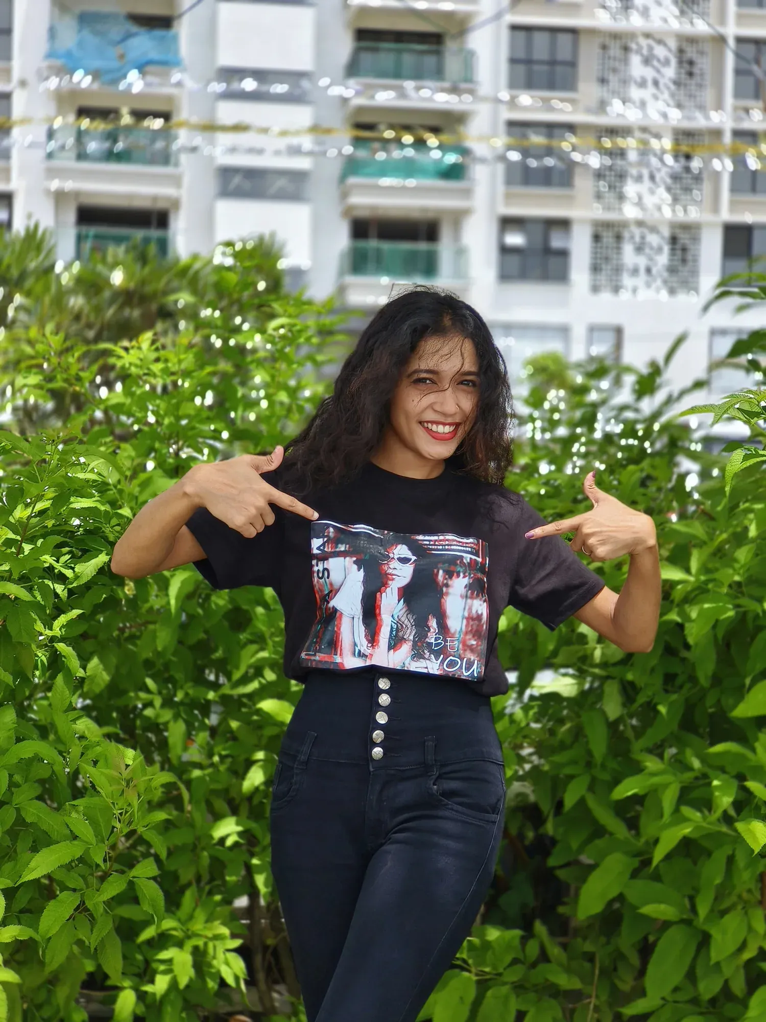 Female model wearing custom black tee